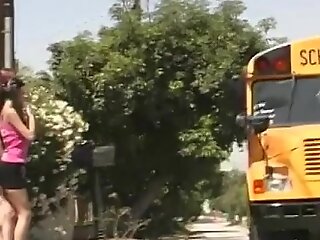 Playful teens schoolbus drove