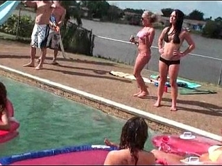 Teen cuties flaunting sexy assets overwrought the pool