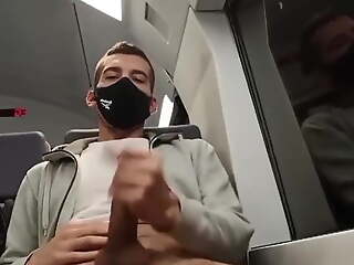 sexy stud jerks off on the train