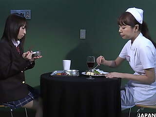 Miharu Kai with attractive nurses in the local hospital's Black Magic ward.