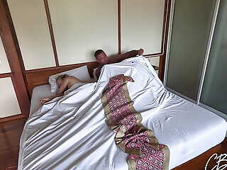 Stepfather and stepdaughter quota a bed in a hotel room