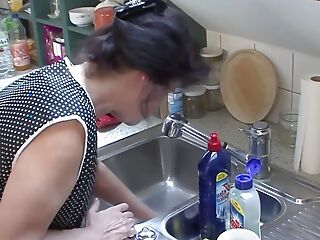 Cleaning descendant 57 Helga fucked in the kitchen